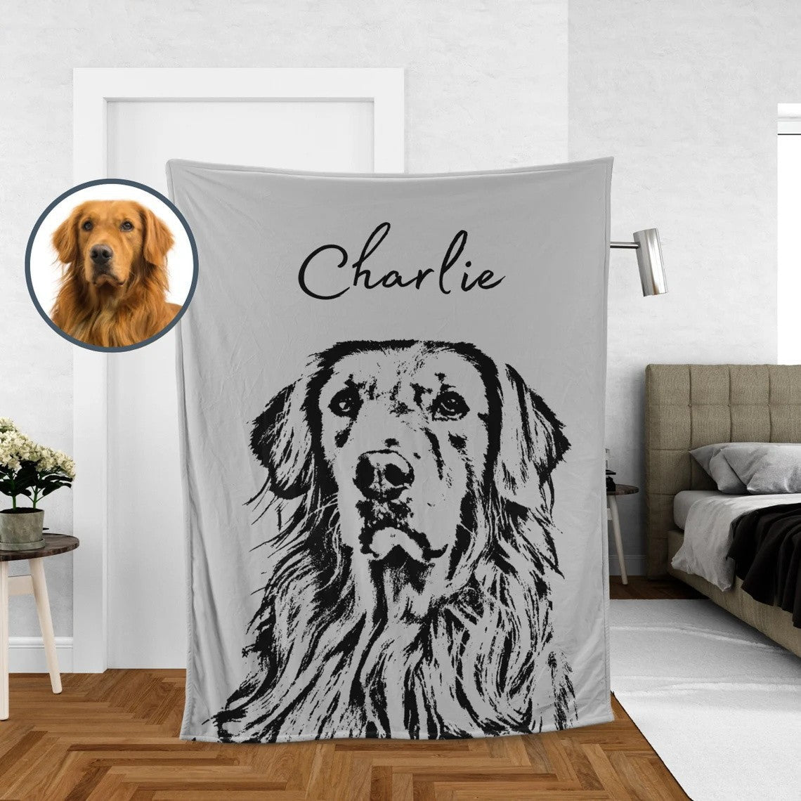 Personalized ink portrait blanket of a golden retriever with the name Charlie, hanging in a bright living room